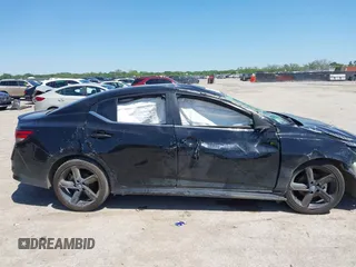 2022 Nissan Sentra SR z VIN 3N1AB8DV0NY313438, wystawiony jako IAAI lot #42076992 z przebiegiem Nie podano mil oraz . Historia ofert i sprzedaży dostępna na DreamBid. Obrazek 13.