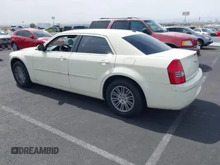 2009 Chrysler 300 Touring with VIN 2C3KA53V39H632191, listed as a IAAI auction lot 41936327 with 148,646 mi miles. Bid and sale history available at carsss.com. Image 3.