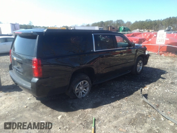 2019 Chevrolet Suburban LT with VIN 1GNSCHKCXKR405939, listed as a IAAI auction lot 41591475 with 106,554 mi miles and . Bid and sale history available at DreamBid. Image 4.