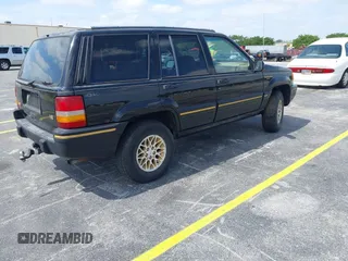 1995 Jeep Grand Cherokee Limited with VIN 1J4GZ78Y0SC578277, listed as a IAAI auction lot 42082848 with 174,288 mi miles. Bid and sale history available at carsss.com. Image 4.