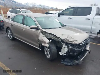 2015 Volkswagen Passat 1.8T Limited Edition with VIN 1VWAS7A30FC089976, listed as a IAAI auction lot 41188354 with 87,950 mi miles. Bid and sale history available at carsss.com. Image 1.