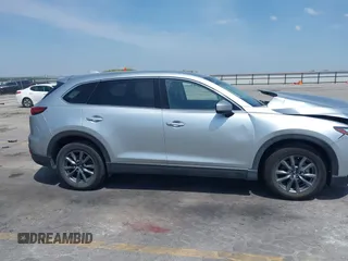 2020 Mazda CX-9 Touring with VIN JM3TCBCY2L0415513, listed as a IAAI auction lot 42481543 with 47,294 mi miles and . Bid and sale history available at DreamBid. Image 13.