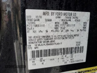 2011 Ford Expedition XLT z VIN 1FMJU1J59BEF13077, wystawiony jako Copart lot #44990515 z przebiegiem 151 317 mil mil oraz Szkoda całkowita • Salvage title. Historia ofert i sprzedaży dostępna na DreamBid. Obrazek 13.