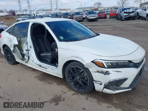2022 Honda Civic Sport with VIN 2HGFE2F52NH568278, listed as a IAAI auction lot 41636234 with 56,844 mi miles. Bid and sale history available at carsss.com. Image 6.