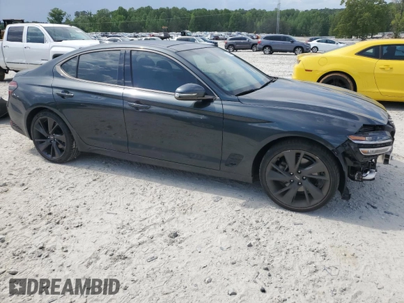 2023 Genesis G70 2.0T with VIN KMTG34TA4PU120566, listed as a Copart auction lot 53307455 with 31,933 mi miles and Salvage title. Bid and sale history available at DreamBid. Image 4.