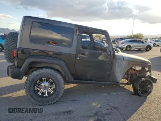 2009 Jeep Wrangler Rubicon with VIN 1J4GA64119L762714, listed as a Copart auction lot 80943364 with Not Provided miles and Salvage Title. Bid and sale history available at DreamBid. Image 3.