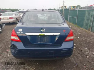 2010 Nissan Versa S with VIN 3N1BC1AP5AL403111, listed as a IAAI auction lot 42594484 with 152,453 mi miles and . Bid and sale history available at DreamBid. Image 17.