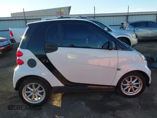 2009 Smart fortwo Pure z VIN WMEEJ31X99K292492, wystawiony jako IAAI lot #41029051 z przebiegiem 57 741 mil mil oraz . Historia ofert i sprzedaży dostępna na DreamBid. Obrazek 13.