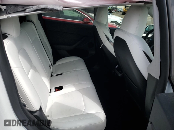 2023 Tesla Model Y Long Range z VIN 7SAYGDEE3PF815088, wystawiony jako Copart lot #54849895 z przebiegiem 19 637 mil mil oraz Szkoda całkowita • Salvage title. Historia ofert i sprzedaży dostępna na DreamBid. Obrazek 11.