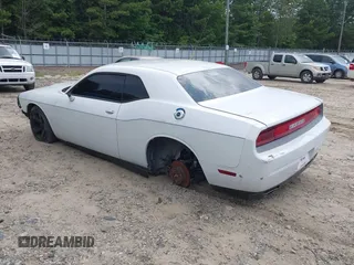2013 Dodge Challenger SXT с VIN 2C3CDYAG0DH607372, выставлен на аукционе IAAI как лот 42819112 с пробегом 223 376 миль миль и . История ставок и продаж доступна на DreamBid. Изображение 3.