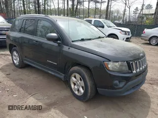2014 Jeep Compass Sport with VIN 1C4NJCBA8ED844538, listed as a IAAI auction lot 41951190 with 157,000 mi miles. Bid and sale history available at carsss.com. Image 1.