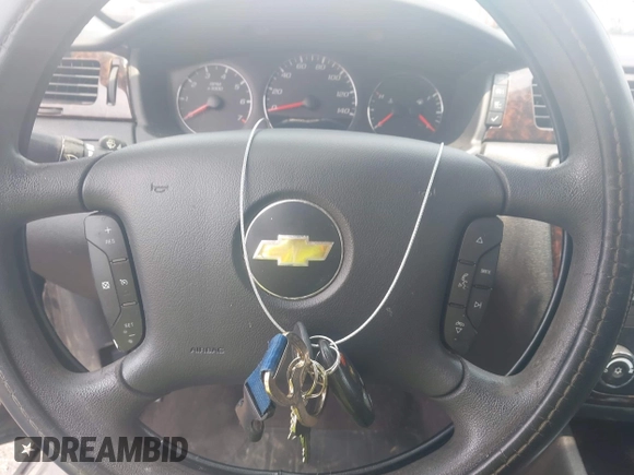 2015 Chevrolet Impala LT with VIN 2G1WB5E33F1127786, listed as a IAAI auction lot 42467374 with 160,964 mi miles and . Bid and sale history available at DreamBid. Image 11.