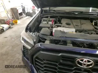 2023 Toyota Tundra SR5 with VIN 5TFLA5DA1PX069615, listed as a Copart auction lot 51152395 with 18,497 mi miles and Salvage title. Bid and sale history available at DreamBid. Image 13.