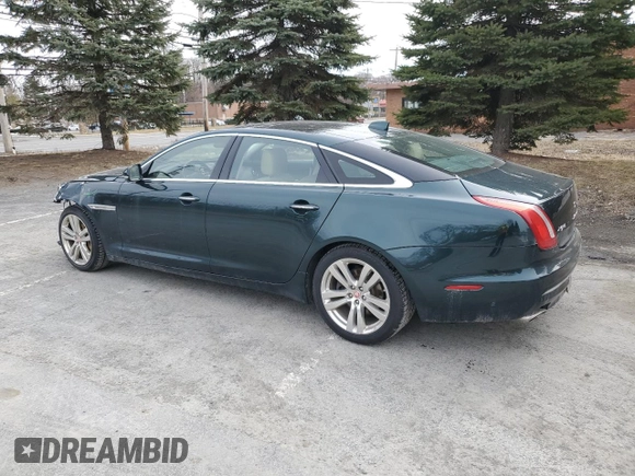 2016 Jaguar XJ Portfolio z VIN SAJWJ2GD0G8V92850, wystawiony jako Copart lot #47844065 z przebiegiem 99 652 mil mil oraz Szkoda całkowita • Salvage title. Historia ofert i sprzedaży dostępna na DreamBid. Obrazek 2.