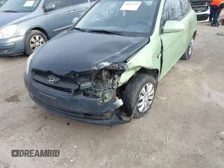 2009 Hyundai Accent Auto SE with VIN KMHCN36C69U112207, listed as a IAAI auction lot 41641298 with 166,804 mi miles. Bid and sale history available at carsss.com. Image 6.