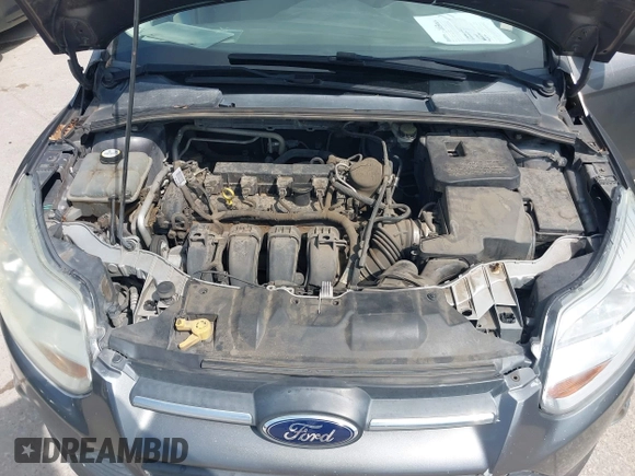 2012 Ford Focus SE z VIN 1FAHP3F24CL294391, wystawiony jako IAAI lot #42545359 z przebiegiem 190 904 mil mil oraz . Historia ofert i sprzedaży dostępna na DreamBid. Obrazek 10.