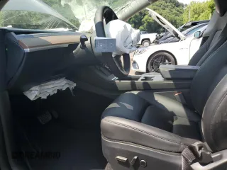 2024 Tesla Model Y с VIN 7SAYGDED1RF092027, выставлен на аукционе Copart как лот 62330775 с пробегом 22 010 миль миль и Списание • Salvage title. История ставок и продаж доступна на DreamBid. Изображение 7.