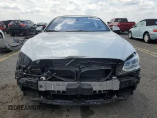 2015 BMW 6 Series 640i xDrive z VIN WBA6B8C53FD453229, wystawiony jako Copart lot #60371214 z przebiegiem 116 624 mil mil oraz Szkoda całkowita • Salvage title. Historia ofert i sprzedaży dostępna na DreamBid. Obrazek 5.