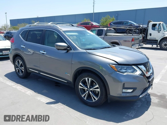 2017 Nissan Rogue SL Hybrid z VIN 5N1ET2MV9HC768242, wystawiony jako IAAI lot #42443514 z przebiegiem 84 879 mil mil oraz . Historia ofert i sprzedaży dostępna na DreamBid. Obrazek 1.