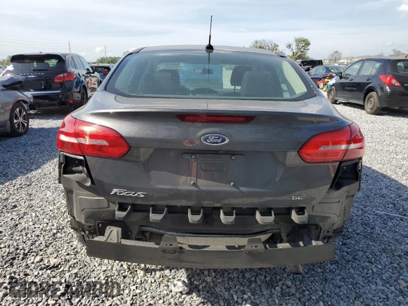 2018 Ford Focus SE with VIN 1FADP3F22JL304959, listed as a Copart auction lot 51994825 with 54,858 mi miles and Salvage Title. Bid and sale history available at DreamBid. Image 6.