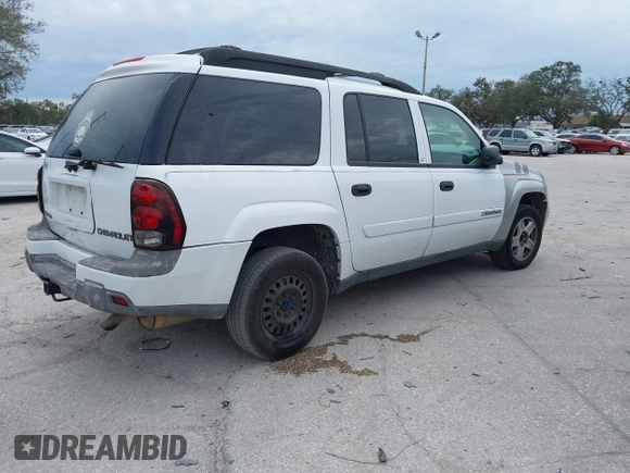 2003 Chevrolet TrailBlazer EXT LT with VIN 1GNES16S736235213, listed as a IAAI auction lot 41237480 with 297,434 mi miles and . Bid and sale history available at DreamBid. Image 4.