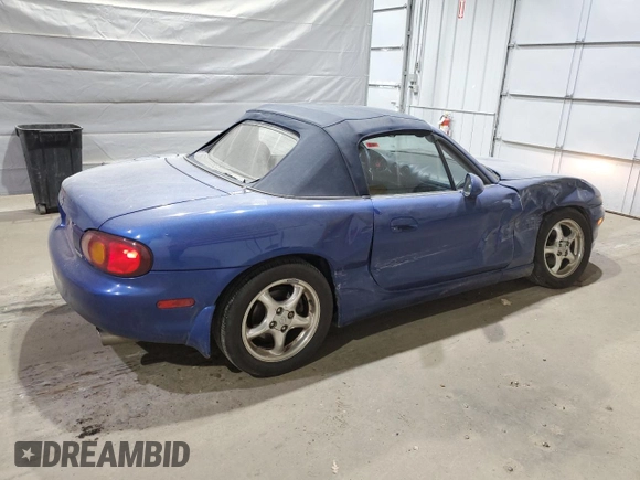 1999 Mazda MX-5 Miata with VIN JM1NB3532X0136645, listed as a Copart auction lot 59480265 with 160,936 mi miles and Clean title. Bid and sale history available at DreamBid. Image 3.