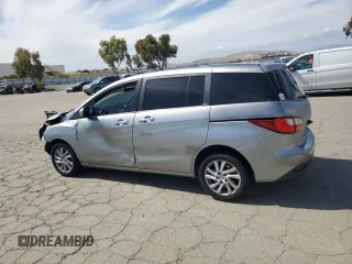 2012 Mazda 5 Sport with VIN JM1CW2BL6C0115401, listed as a Copart auction lot 57275225 with 144,311 mi miles and Non repairable. Bid and sale history available at DreamBid. Image 2.