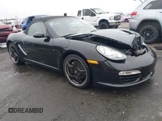 2012 Porsche Boxster with VIN WP0CA2A88CS710105, listed as a IAAI auction lot 41155672 with 108,103 mi miles. Bid and sale history available at carsss.com. Image 1.