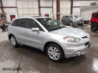 2007 Acura RDX with VIN 5J8TB18237A008473, listed as a IAAI auction lot 41555769 with 129,373 mi miles. Bid and sale history available at carsss.com. Image 1.
