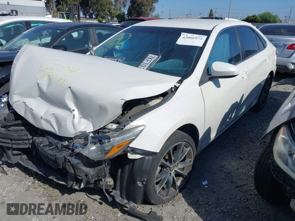 2015 Toyota Camry XLE with VIN 4T1BF1FK3FU913743, listed as a IAAI auction lot 42066972 with 136,917 mi miles and . Bid and sale history available at DreamBid. Image 2.