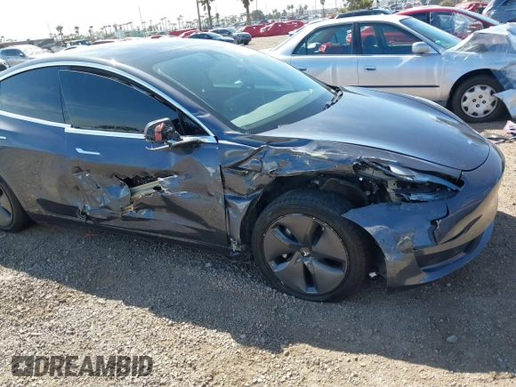 2020 Tesla Model 3 Standard Range Plus with VIN 5YJ3E1EA5LF644282, listed as a IAAI auction lot 41710124 with 69,969 mi miles and . Bid and sale history available at DreamBid. Image 6.