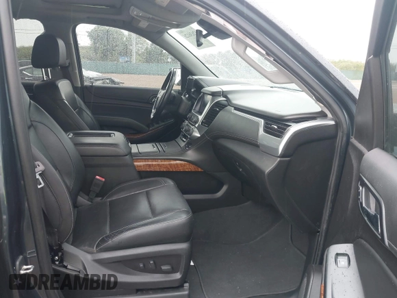 2020 Chevrolet Suburban Premier with VIN 1GNSCJKC8LR290783, listed as a IAAI auction lot 42636126 with 59,371 mi miles and . Bid and sale history available at DreamBid. Image 5.
