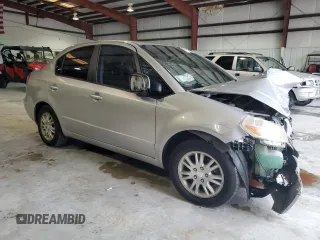 2012 Suzuki SX4 LE with VIN JS2YC5A34C6304150, listed as a Copart auction lot 48629255 with 104,658 mi miles and Salvage Title. Bid and sale history available at carsss.com. Image 4.