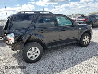 2009 Mercury Mariner z VIN 4M2CU81799KJ25621, wystawiony jako Copart lot #53109105 z przebiegiem 206 186 mil mil oraz Szkody całkowita. Historia ofert i sprzedaży dostępna na DreamBid. Obrazek 3.