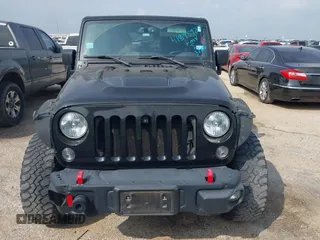 2015 Jeep Wrangler Unlimited Rubicon z VIN 1C4BJWFG2FL572417, wystawiony jako IAAI lot #41895927 z przebiegiem 54 981 mil mil oraz . Historia ofert i sprzedaży dostępna na DreamBid. Obrazek 12.