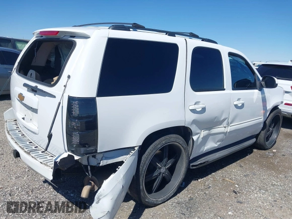 2012 Chevrolet Tahoe LS with VIN 1GNSCAE06CR141256, listed as a IAAI auction lot 41806708 with 105,984 mi miles and . Bid and sale history available at DreamBid. Image 4.
