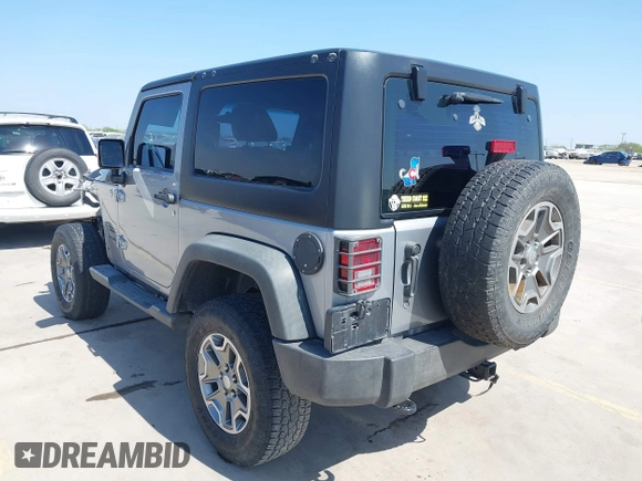 2014 Jeep Wrangler Sport with VIN 1C4AJWAG9EL155409, listed as a IAAI auction lot 41869906 with 102,400 mi miles and . Bid and sale history available at carsss.com. Image 3.