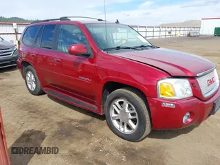 2006 GMC Envoy Denali with VIN 1GKET63M462331096, listed as a IAAI auction lot 42152866 with 182,682 mi miles. Bid and sale history available at carsss.com. Image 1.