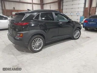 2019 Hyundai Kona SEL with VIN KM8K6CAA4KU382976, listed as a IAAI auction lot 41820749 with 61,619 mi miles. Bid and sale history available at carsss.com. Image 4.