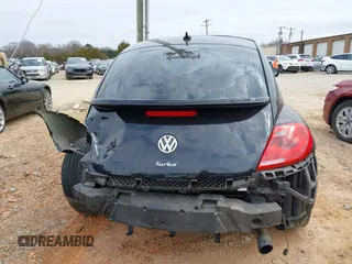 2012 Volkswagen Beetle 2.0T Turbo with VIN 3VW467AT9CM658495, listed as a IAAI auction lot 41505160 with 138,842 mi miles. Bid and sale history available at carsss.com. Image 17.