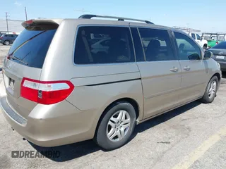 2006 Honda Odyssey EX-L with VIN 5FNRL38646B044795, listed as a IAAI auction lot 42102422 with 213,194 mi miles and . Bid and sale history available at carsss.com. Image 4.