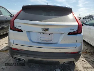 2019 Cadillac XT4 FWD Premium Luxury with VIN 1GYFZCR42KF147440, listed as a Copart auction lot 74999994 with Not provided miles and Salvage title. Bid and sale history available at DreamBid. Image 6.