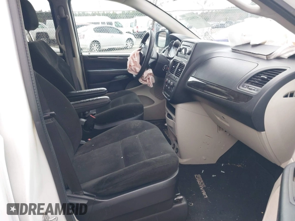 2015 Dodge Grand Caravan SE with VIN 2C4RDGBG2FR714404, listed as a IAAI auction lot 41860254 with 212,599 mi miles and . Bid and sale history available at DreamBid. Image 5.