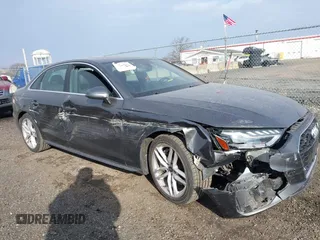 2022 Audi A4 S line Premium Plus z VIN WAUEAAF41NN015360, wystawiony jako IAAI lot #41320262 z przebiegiem 63 275 mil mil oraz . Historia ofert i sprzedaży dostępna na DreamBid. Obrazek 18.