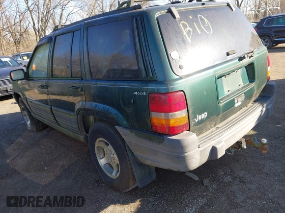 1997 Jeep Grand Cherokee Laredo with VIN 1J4GZ58S2VC605385, listed as a IAAI auction lot 41797715 with 169,996 mi miles and . Bid and sale history available at DreamBid. Image 3.