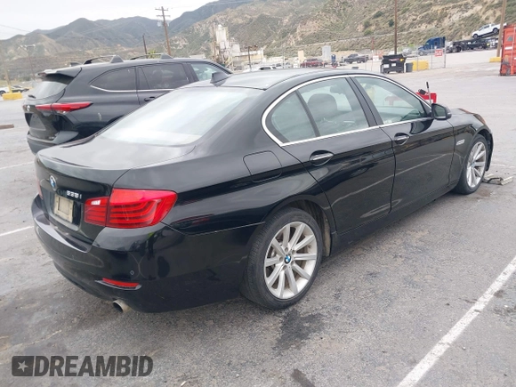 2015 BMW 5 Series 535i with VIN WBA5B1C55FD922761, listed as a IAAI auction lot 42021799 with 118,592 mi miles and . Bid and sale history available at carsss.com. Image 4.