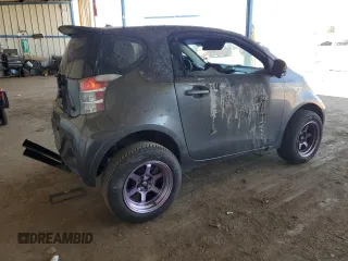 2012 Scion iQ z VIN JTNJJXB09CJ012794, wystawiony jako Copart lot #52983435 z przebiegiem 135 927 mil mil oraz Szkoda całkowita • Salvage title. Historia ofert i sprzedaży dostępna na DreamBid. Obrazek 3.