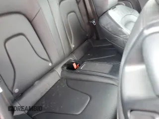 2014 Audi S5 Premium Plus z VIN WAUCGAFH5EN015371, wystawiony jako Copart lot #74150454 z przebiegiem Nie podano mil oraz Szkody całkowita. Historia ofert i sprzedaży dostępna na DreamBid. Obrazek 10.
