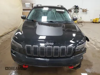 2019 Jeep Cherokee Trailhawk Elite with VIN 1C4PJMBX2KD227246, listed as a Copart auction lot 87815615 with 88,636 mi miles and Salvage Title. Bid and sale history available at carsss.com. Image 5.