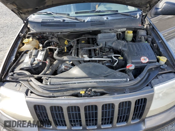 1999 Jeep Grand Cherokee Limited with VIN 1J4GW68S2XC677334, listed as a Copart auction lot 74152054 with 242,220 mi miles and Salvage Title. Bid and sale history available at carsss.com. Image 13.